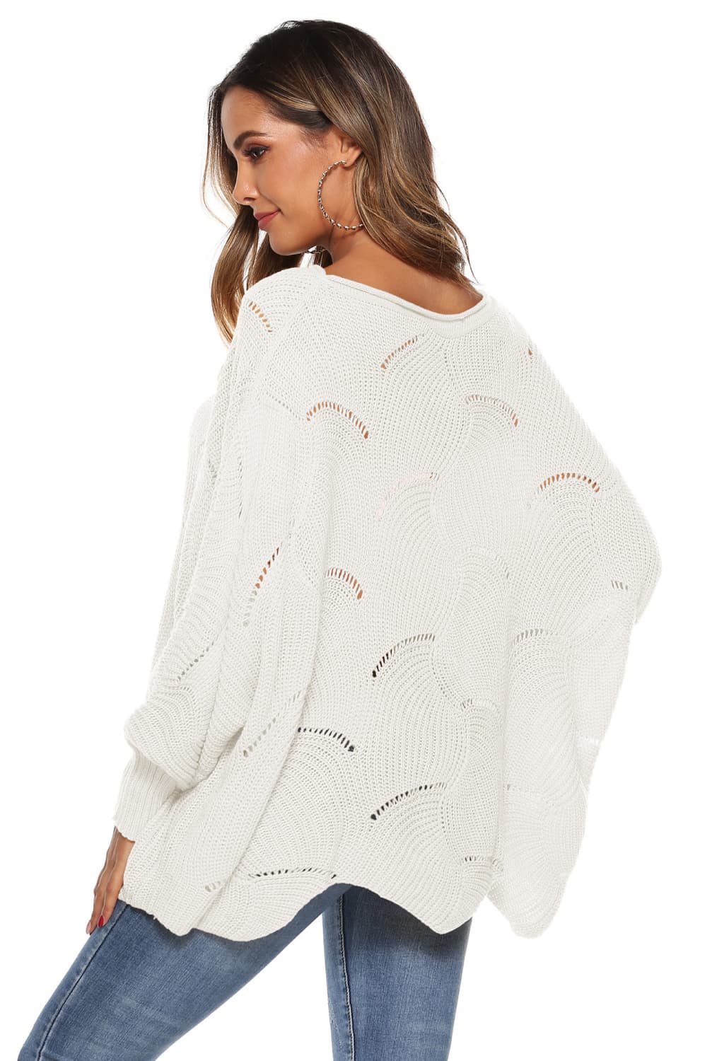 White openwork cocoon sleeve knit sweater with boat neck and relaxed fit.