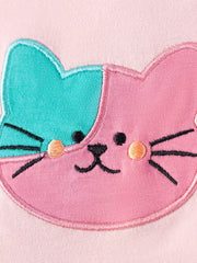 Children's pink dress with a two-tone embroidered cat face detail.