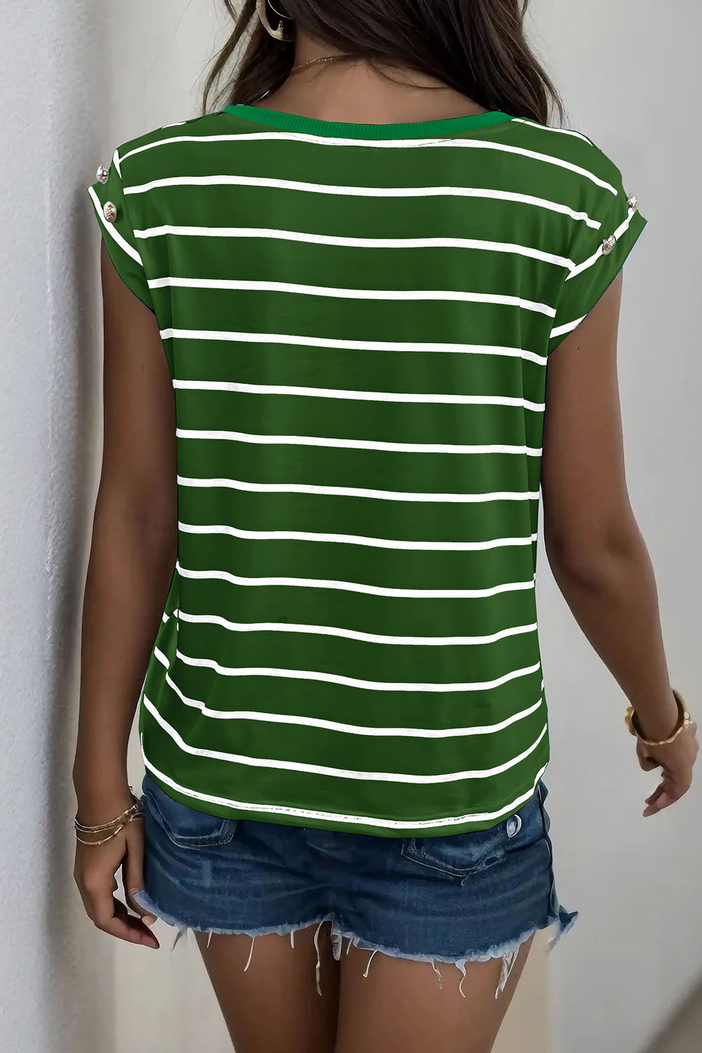 Green and white striped tee with cap sleeves and button detail on shoulder.