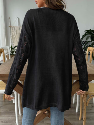 Black openwork diamond knit duster cardigan with long sleeves and a relaxed fit.