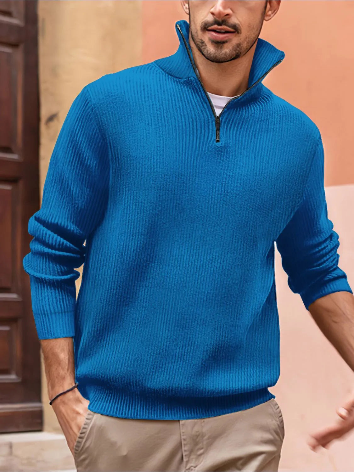 Textured ribbed quarter-zip pullover sweater in cerulean blue with a stand-up collar.