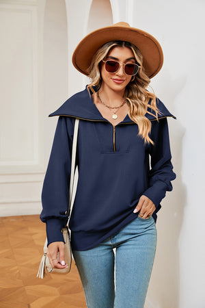 Navy blue wide collar zip-through sweatshirt with a relaxed fit.