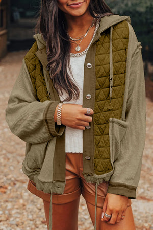 Olive quilted panel waffle knit hoodie with contrast sleeves and adjustable drawstring hem.