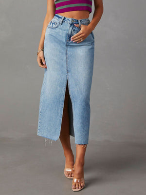 Light wash denim midi skirt with raw hem and front slit