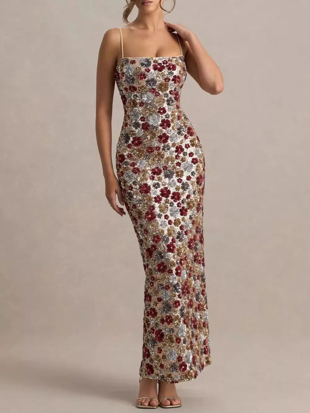 Floral sequin bodycon maxi dress with spaghetti straps and a square neckline.