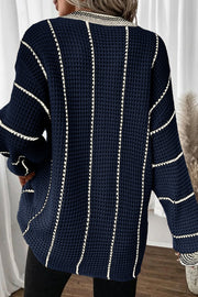 Dark Navy knit oversized V-neck dress with vertical white stripe detail and waffle texture.