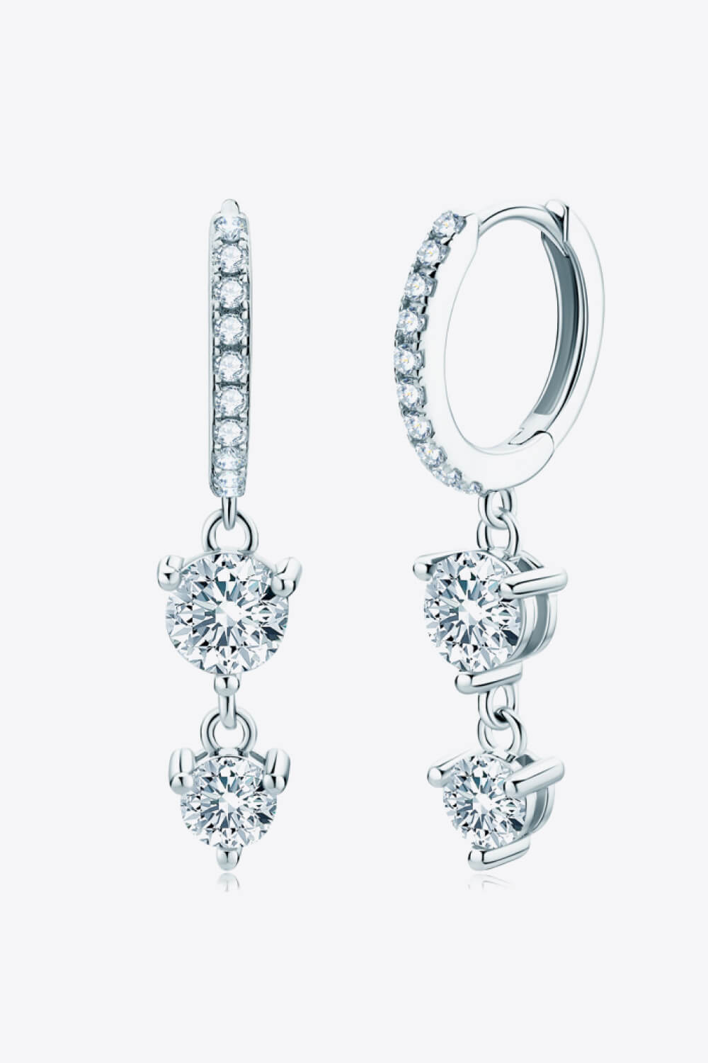 Silver hoop earrings with cascading moissanite drop accents.