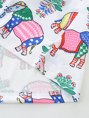 Toddler dress with a white background and a colorful, whimsical elephant print.