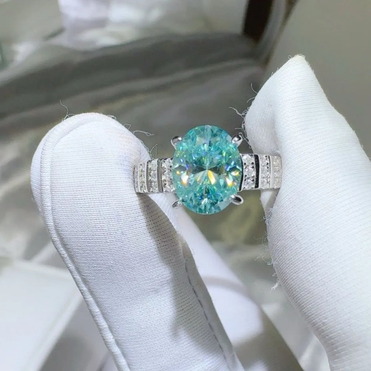 Aquamarine halo oval ring with diamond band