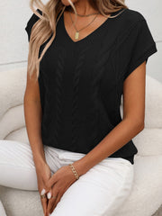 Black cable knit V-neck vest with short sleeves and a relaxed fit.