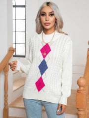 White argyle cable-knit mock neck sweater with pink and blue diamonds