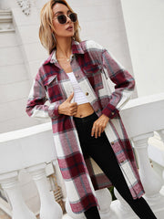 Burgundy plaid duster shirt jacket with button front and chest pockets.