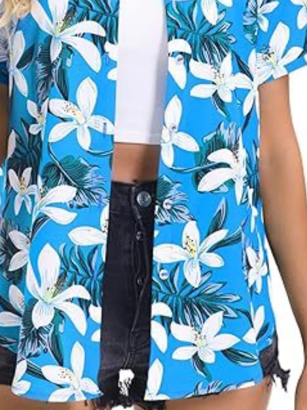 Tropical hibiscus print button-up shirt in sky blue with white flowers and green leaves.