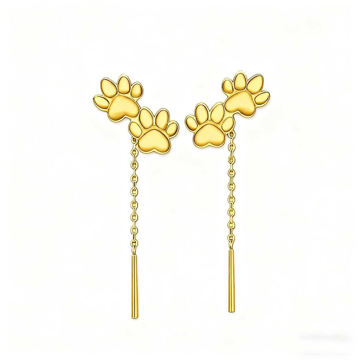 Gold paw print drop earrings with chain and bar detail