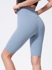 Light blue high-waisted active cycling shorts with a seamless contour detail.