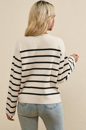 Beige knit cardigan with black nautical stripes and button-up front.