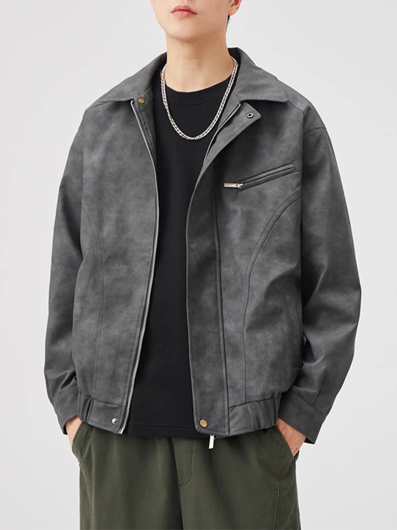 Men's dark gray zip-up leather jacket with a chest pocket detail.