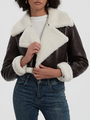 Brown cropped aviator jacket with white shearling trim and collar.