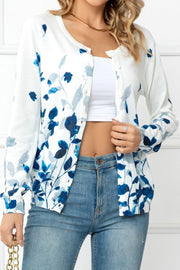 White crewneck cardigan with blue botanical print and buttons