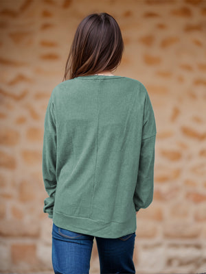 Waffle knit relaxed fit crewneck top in Gum Leaf green with long sleeves and a crew neckline.