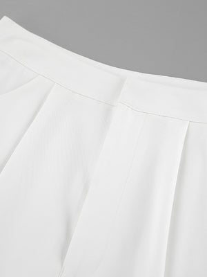 White two-piece set pants detail with pleats and snap closure