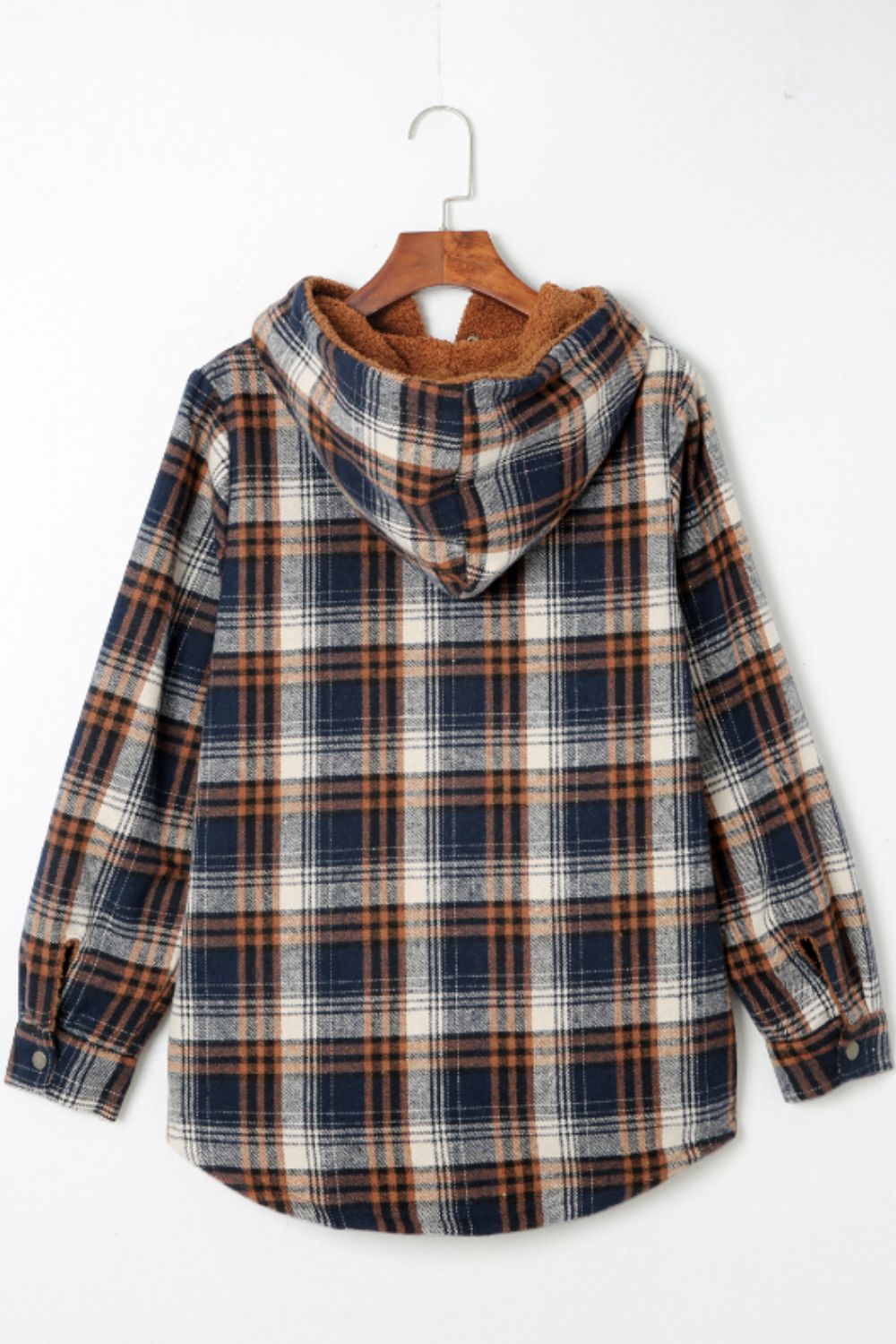 Sherpa-lined plaid overshirt jacket in navy, tan, and cream with a hood.
