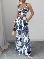 Blue and white tropical print crop top and wide-leg pants set with tie straps