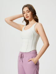 White sculpted seam tank top with built-in support and scoop neckline.