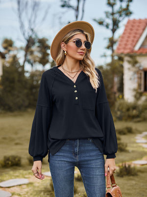 Black ribbed henley hoodie with balloon sleeves and button detail