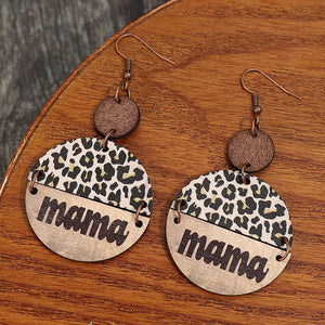 Leopard print "mama" drop earrings in mocha and khaki with wood accents.