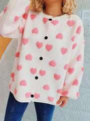 Textured white acrylic button-down cardigan with pink heart motifs and black buttons.