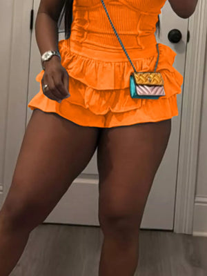 Orange ribbed scoop neck cami with tiered ruffled skirt ensemble, casual women's outfit.