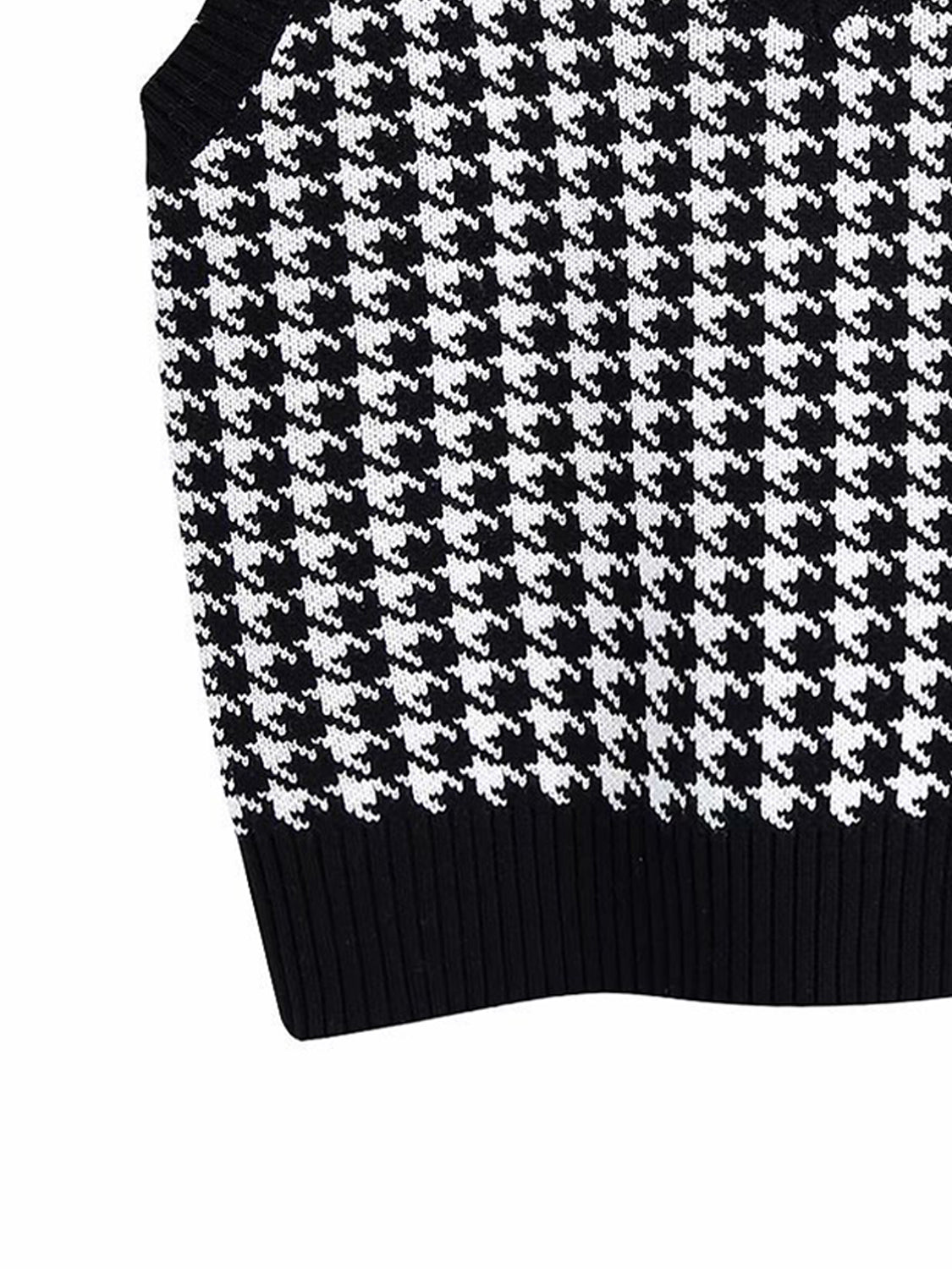 Houndstooth knit V-neck tank top in black and white.