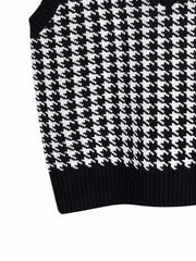 Houndstooth knit V-neck tank top in black and white.
