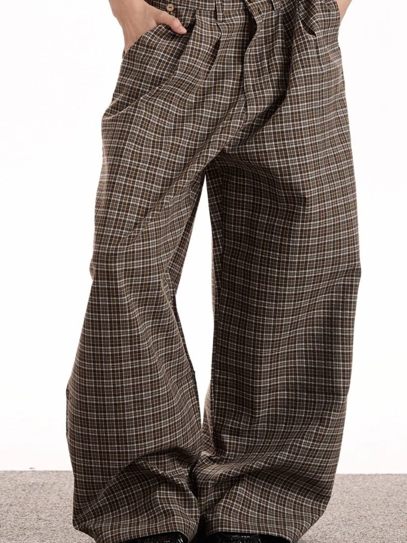 Men's brown plaid cotton wide leg trousers with a high waist.