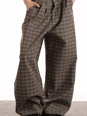 Men's brown plaid cotton wide leg trousers with a high waist.