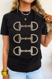 Black cotton t-shirt with equestrian bit graphic in checkered, leopard, and polka dot patterns.