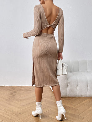 Textured backless midi dress in tan with long sleeves and a deep V-back.