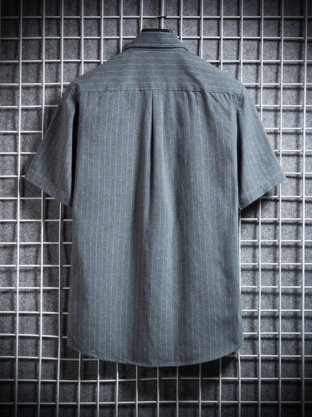 Grey pinstripe short sleeve buttoned shirt with a classic collar.