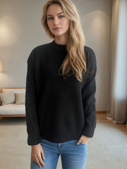 Black textured knit crew neck pullover sweater with long sleeves.