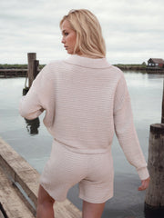 Textured polo knit short set in light beige with a ribbed pattern.