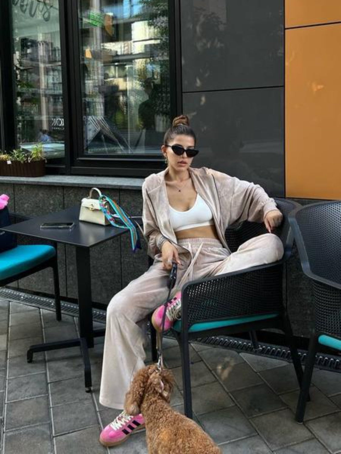 Plush velour lounge set in sand color with wide leg pants and a relaxed fit jacket.
