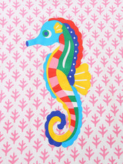 Toddler tee with colorful seahorse graphic on white cotton with pink leaf pattern.