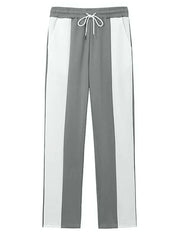 Panelled track pants in gray and white with drawstring waist.