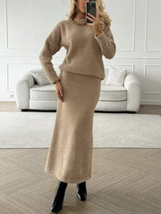 Tan textured knit co-ord set with relaxed silhouette sweater and maxi skirt.