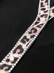 Black blouse with leopard print trim and white buttons