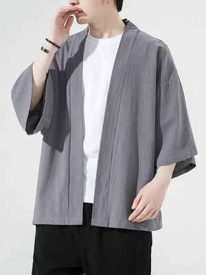 Grey oversized casual open front jacket with wide sleeves and a relaxed fit.