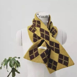 Cozy argyle pattern wool scarf in mustard yellow and brown.