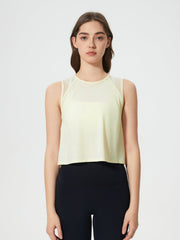 Pastel Yellow cropped active tank with mesh inset shoulders and crew neck.