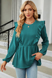 Teal textured peplum blouse with ruffle detail and long sleeves